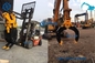 Ganchos agarradores hidráulicos de la construcción de carreteras para la correa eslabonada de madera Digger Parts de los excavadores